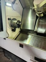 B-axis universal milling head on Okuma MULTUS CNC multitasking machine